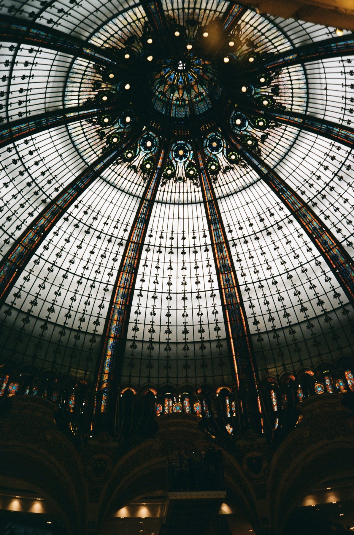 Looking up into the stained-glass dome of Galeries Lafayette